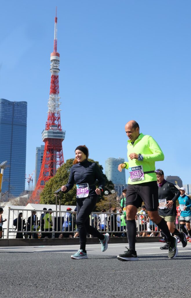 The running ginger and Roger finishing Tokyo Marathon