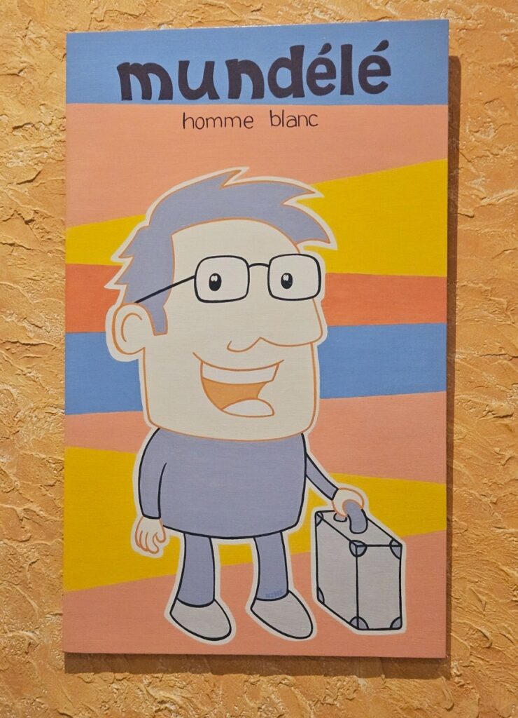 A painting in Pointe Noire: This is how they depict the "white man" in Pointe Noire: as a business man