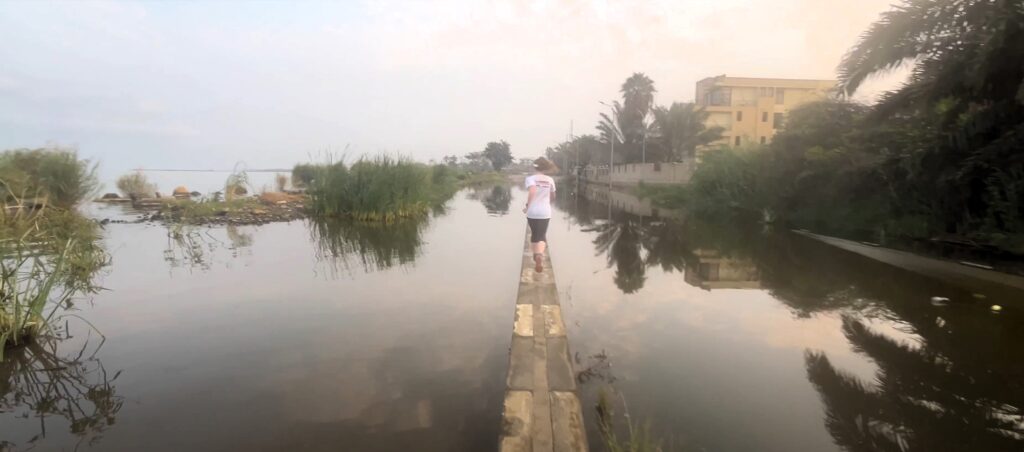 Running along the shore of Lake Tanganika in Bujumbura, Burundi, in June 2025