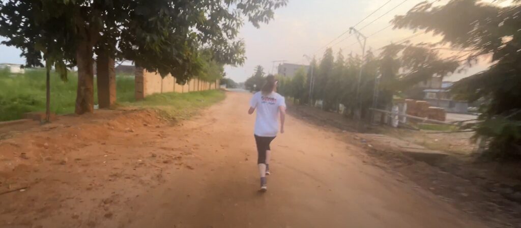 Running along the shore of Lake Tanganika in Bujumbura, Burundi, in June 2025