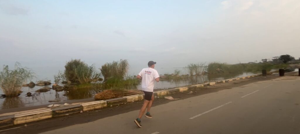 Running along the shore of Lake Tanganika in Bujumbura, Burundi, in June 2025