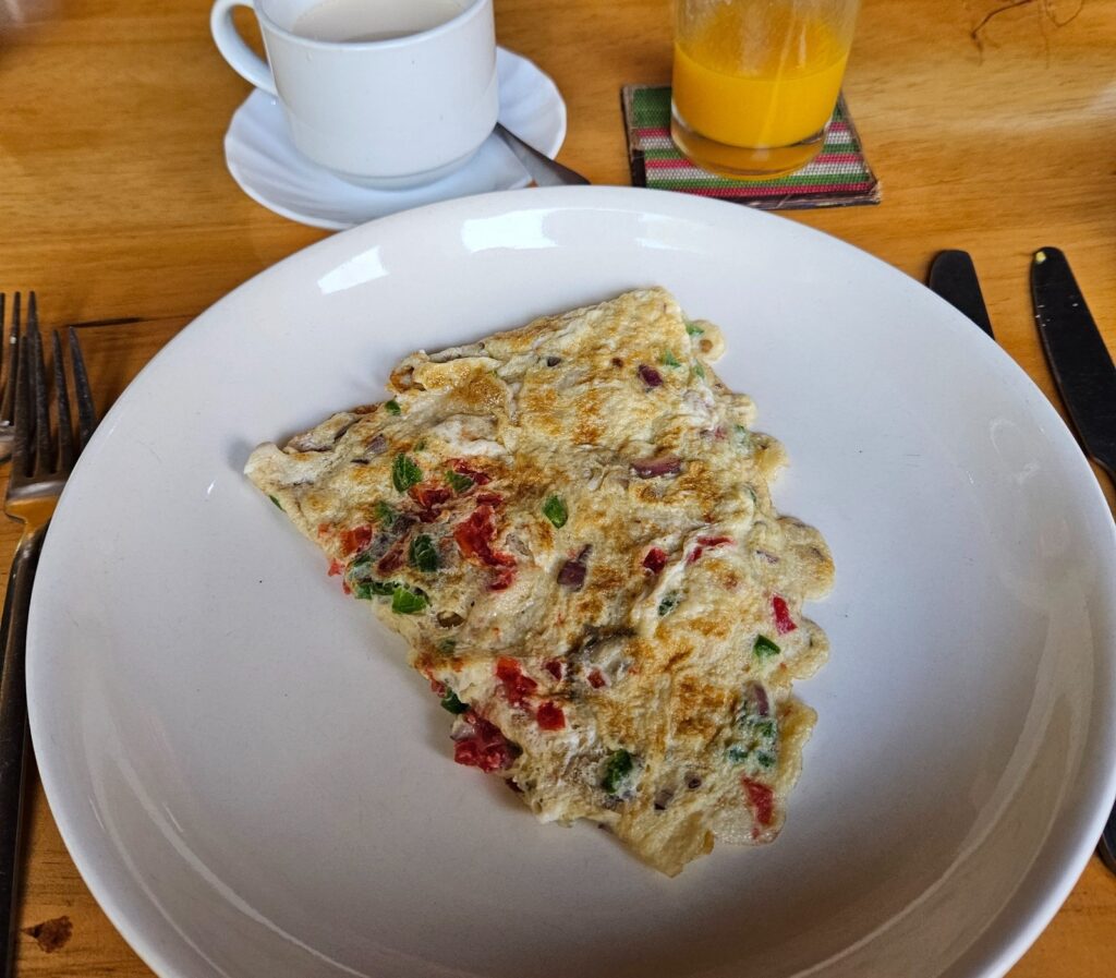 A Spanish omelette which is an omelette with vegetables cut small in Uganda