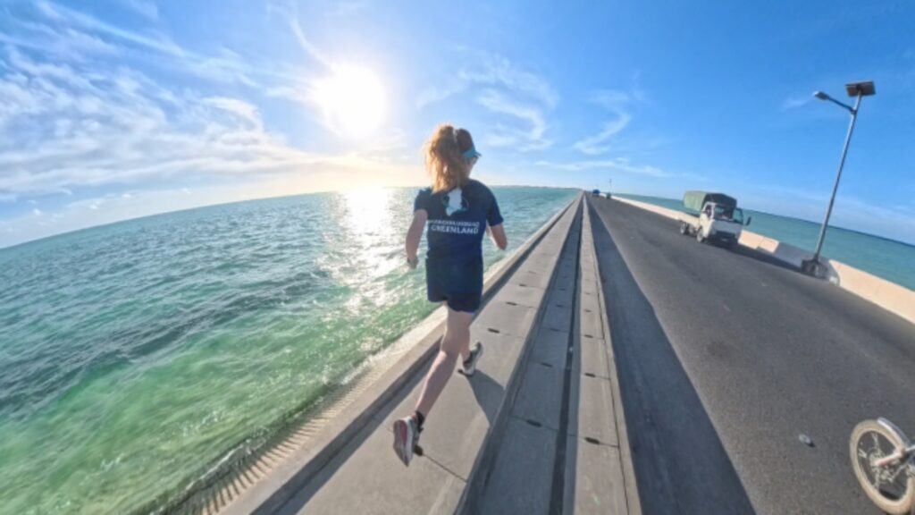 Images of our run in Betio, Kiribati in 2025. The running ginger running in the Betio - Bairiki Highway in Kiribati.