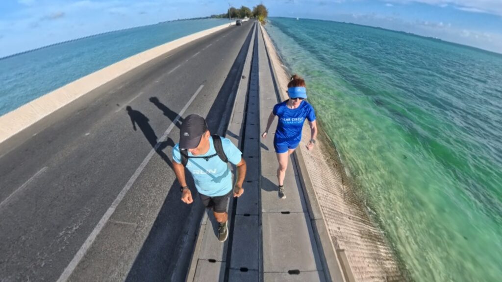Images of our run in Betio, Kiribati in 2025. The running ginger running in the Betio - Bairiki Highway in Kiribati.