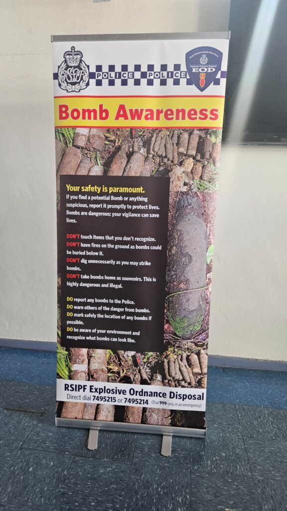 A warning sign in the airport of Solomon Islands about bombs!
