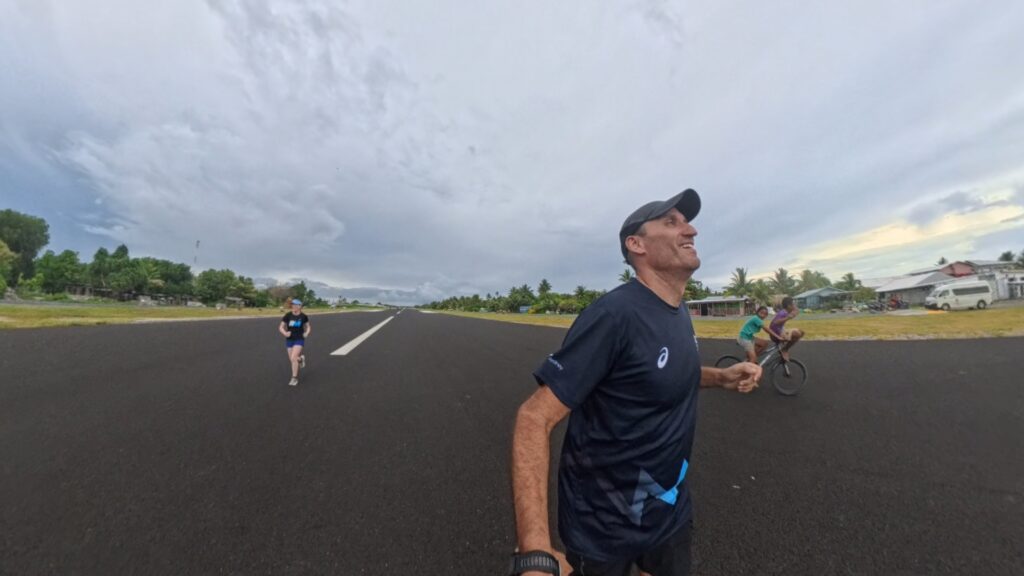 The running ginger running in Tuvalu, the least visited country of the world. Images of her 10k run in Funafuti.
