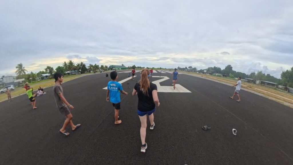 The running ginger running in Tuvalu, the least visited country of the world. Images of her 10k run in Funafuti.