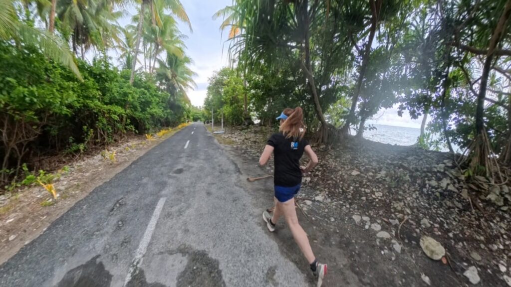 The running ginger running in Tuvalu, the least visited country of the world. Images of her 10k run in Funafuti.