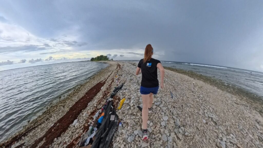 The running ginger running in Tuvalu, the least visited country of the world. Images of her 10k run in Funafuti.