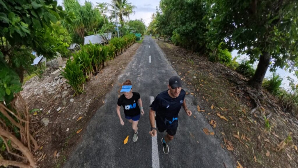 The running ginger running in Tuvalu, the least visited country of the world. Images of her 10k run in Funafuti.