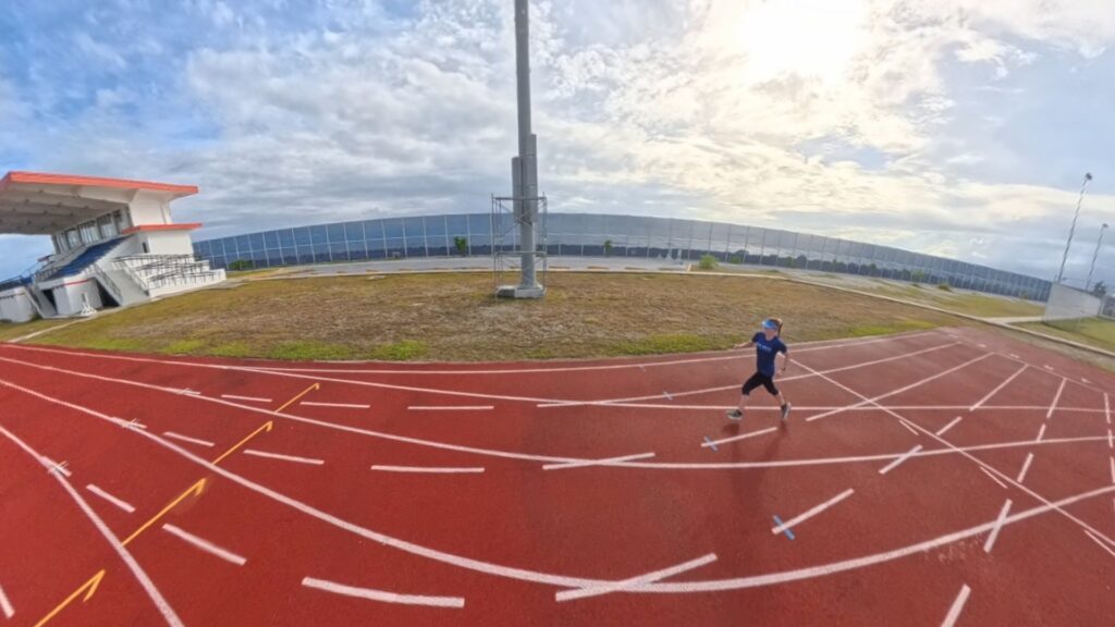 The running ginger running in the Track and Field Stadium in the Majuro Atoll in the Marshall Islands in 2025