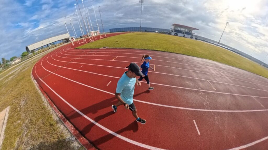 The running ginger running in the Track and Field Stadium in the Majuro Atoll in the Marshall Islands in 2025