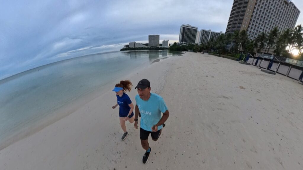 The running ginger running in Tumon Beach in Guam 