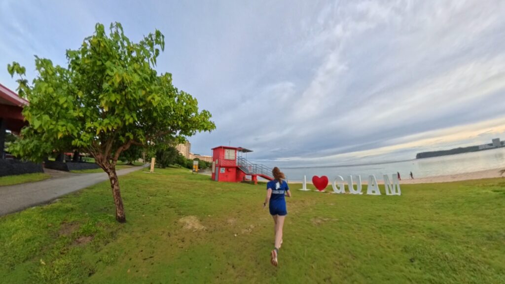 The running ginger running in Tumon Beach in Guam 