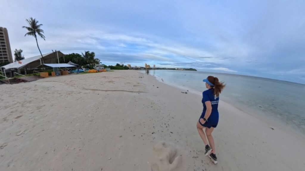 The running ginger running in Tumon Beach in Guam 