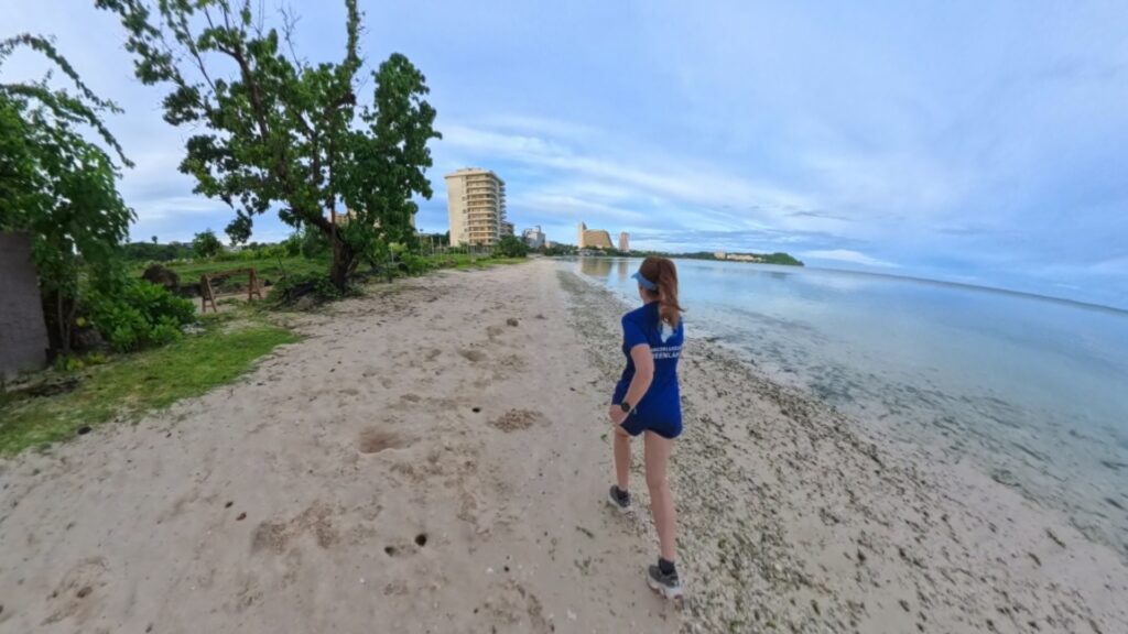 The running ginger running in Tumon Beach in Guam 