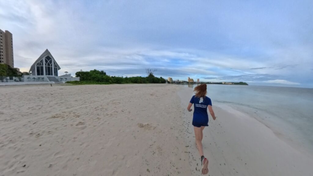The running ginger running in Tumon Beach in Guam 