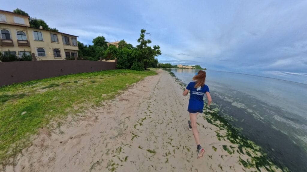 The running ginger running in Tumon Beach in Guam 