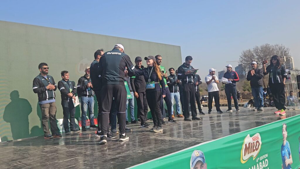 The running ginger in Islamabad Marathon in pakistan in 2026. Third place female overall. Awards Ceremony.