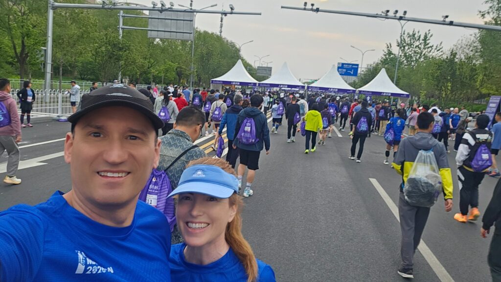 The running ginger running with robots: humanoid robot e-town half marathon in Beijing in 2026