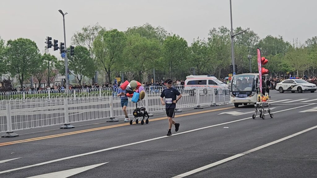 The running ginger running with robots: humanoid robot e-town half marathon in Beijing in 2026